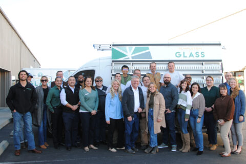 Group shot of Templeton Glass company people and volunteers with the SLO Chamber of Commerce in front of a Templeton Glass truck
