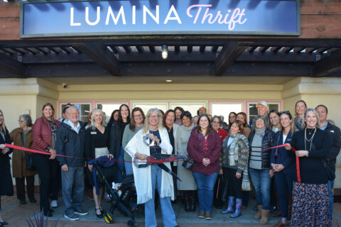 People gathered for the grand opening of Lumina Thrift, a community event hosted by the San Luis Obispo Chamber of Commerce.