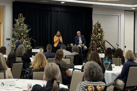 Picture of Senator John Laird and Assemblymember Dawn Addis at a State of the State event at Embassy Suites in San Luis Obispo, Moderated by John Meyers