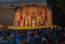 photo of the Central Coast Shakespeare Festival on stage with audience in SLO County i nan outdoor setting.